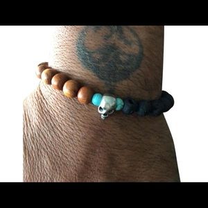 turquoise beads with steel skull & black lava